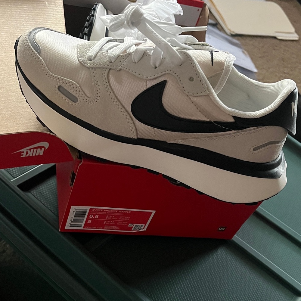 Nike Cream and Black Running Shoes